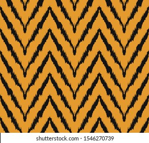 Diagonal ikat stripes. Zigzag pattern seamless. Geometric chevron abstract illustration, wallpaper. Tribal ethnic vector texture. Aztec style. Folk embroidery. Indian, Scandinavian,  African rug.