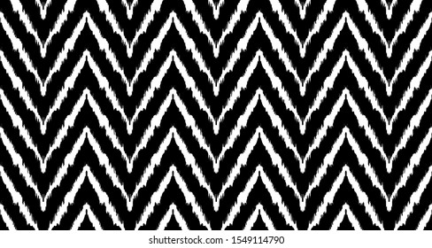 Diagonal ikat stripes. Zigzag pattern seamless. Geometric chevron abstract illustration, wallpaper. Tribal ethnic vector texture. Aztec style. Folk embroidery. Indian, Scandinavian,  African rug.