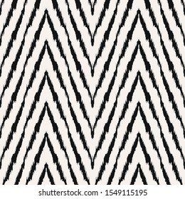 Diagonal ikat stripes. Zigzag pattern seamless. Geometric chevron abstract illustration, wallpaper. Tribal ethnic vector texture. Aztec style. Folk embroidery. Indian, Scandinavian,  African rug.