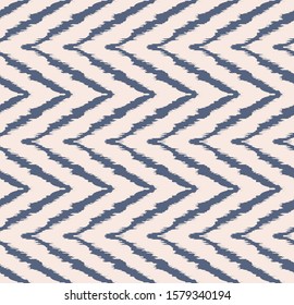 Diagonal ikat stripes. Zigzag pattern seamless. Geometric chevron abstract illustration, wallpaper. Tribal ethnic vector texture. Aztec style. Folk embroidery. Indian, Scandinavian,  African rug.
