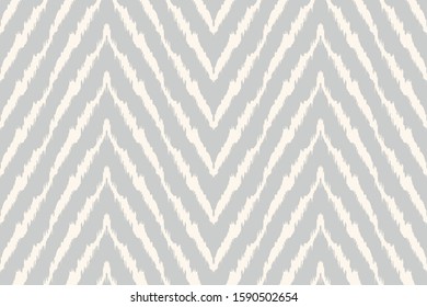 Diagonal ikat stripes. Zigzag pattern seamless. Geometric chevron abstract illustration, wallpaper. Tribal ethnic vector texture. Aztec style. Folk embroidery. Indian, Scandinavian,  African rug.