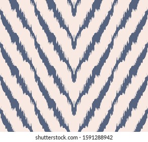 Diagonal ikat stripes. Zigzag pattern seamless. Geometric chevron abstract illustration, wallpaper. Tribal ethnic vector texture. Aztec style. Folk embroidery. Indian, Scandinavian,  African rug.