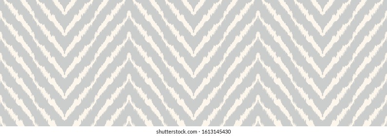 Diagonal ikat stripes. Zigzag pattern seamless. Geometric chevron abstract illustration, wallpaper. Tribal ethnic vector texture. Aztec style. Folk embroidery. Indian, Scandinavian,  African rug.