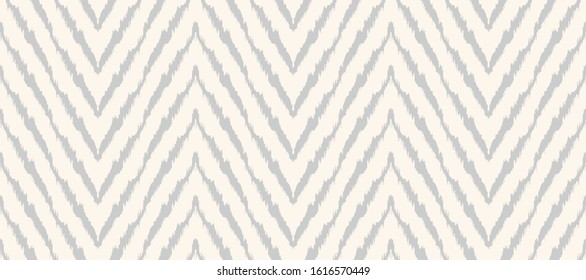 Diagonal ikat stripes. Zigzag pattern seamless. Geometric chevron abstract illustration, wallpaper. Tribal ethnic vector texture. Aztec style. Folk embroidery. Indian, Scandinavian,  African rug.