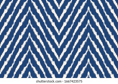 Diagonal ikat stripes. Zigzag pattern seamless. Geometric chevron abstract illustration, wallpaper. Tribal ethnic vector texture. Aztec style. Folk embroidery. Indian, Scandinavian,  African rug.