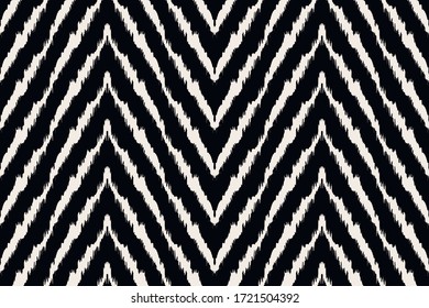 Diagonal ikat stripes. Zigzag pattern seamless. Geometric chevron abstract illustration, wallpaper. Tribal ethnic vector texture. Aztec style. Folk embroidery. Indian, Scandinavian,  African rug.