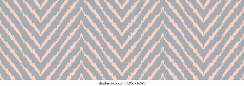 Diagonal ikat stripes. Zigzag pattern seamless. Geometric chevron abstract illustration, wallpaper. Tribal ethnic vector texture. Aztec style. Folk embroidery. Indian, Scandinavian,  African rug.
