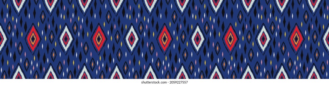Diagonal ikat stripes. Zigzag pattern seamless. Geometric chevron abstract illustration, wallpaper. Tribal ethnic vector texture. Aztec style. Folk embroidery. Indian, Scandinavian, African rug.