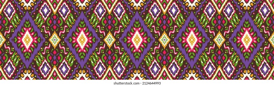 Diagonal ikat stripes. Zigzag pattern seamless. Geometric chevron abstract illustration, wallpaper. Tribal ethnic vector texture. Aztec style. Folk embroidery. Indian, Scandinavian, African rug.