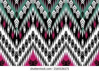 Diagonal ikat stripes. Zigzag pattern seamless. Geometric chevron abstract illustration, wallpaper. Tribal ethnic vector texture. Aztec style. Folk embroidery. Indian, Scandinavian, African rug.