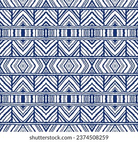 Diagonal ikat stripes. Zigzag pattern seamless. Geometric chevron abstract illustration, wallpaper. Tribal ethnic vector texture. Aztec style. Folk embroidery. Indian, Scandinavian, African rug.