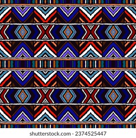 Diagonal ikat stripes. Zigzag pattern seamless. Geometric chevron abstract illustration, wallpaper. Tribal ethnic vector texture. Aztec style. Folk embroidery. Indian, Scandinavian, African rug.