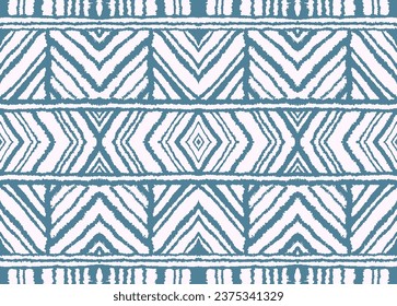 Diagonal ikat stripes. Zigzag pattern seamless. Geometric chevron abstract illustration, wallpaper. Tribal ethnic vector texture. Aztec style. Folk embroidery. Indian, Scandinavian, African rug.