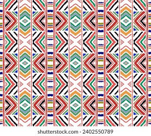Diagonal ikat stripes. Zigzag pattern seamless. Geometric chevron abstract illustration, wallpaper. Tribal ethnic vector texture. Aztec style. Folk embroidery. Indian, Scandinavian, African rug.