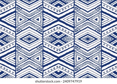 Diagonal ikat stripes. Zigzag pattern seamless. Geometric chevron abstract illustration, wallpaper. Tribal ethnic vector texture. Aztec style. Folk embroidery. Indian, Scandinavian, African rug.