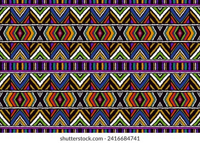 Diagonal ikat stripes. Zigzag pattern seamless. Geometric chevron abstract illustration, wallpaper. Tribal ethnic vector texture. Aztec style. Folk embroidery. Indian, Scandinavian, African rug.