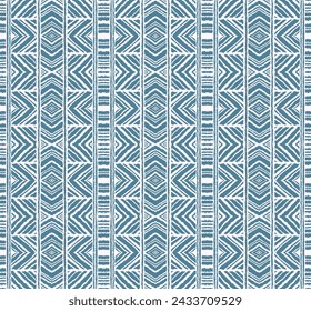 Diagonal ikat stripes. Zigzag pattern seamless. Geometric chevron abstract illustration, wallpaper. Tribal ethnic vector texture. Aztec style. Folk embroidery. Indian, Scandinavian, African rug.