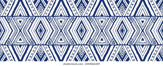 Diagonal ikat stripes. Zigzag pattern seamless. Geometric chevron abstract illustration, wallpaper. Tribal ethnic vector texture. Aztec style. Folk embroidery. Indian, Scandinavian, African rug.