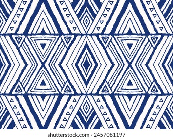 Diagonal ikat stripes. Zigzag pattern seamless. Geometric chevron abstract illustration, wallpaper. Tribal ethnic vector texture. Aztec style. Folk embroidery. Indian, Scandinavian, African rug.