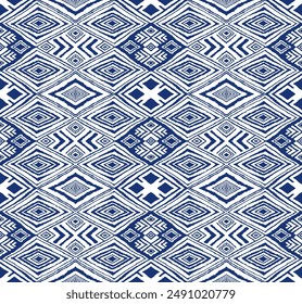 Diagonal ikat stripes. Zigzag pattern seamless. Geometric chevron abstract illustration, wallpaper. Tribal ethnic vector texture. Aztec style. Folk embroidery. Indian, Scandinavian, African rug.