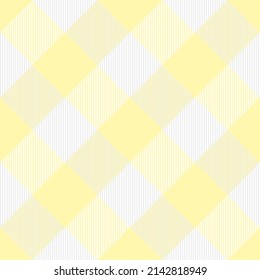 Diagonal tartan Easter plaid. Scottish pattern in white and yellow cage. Scottish cage. Traditional Scottish checkered background. Seamless fabric texture. Vector illustration