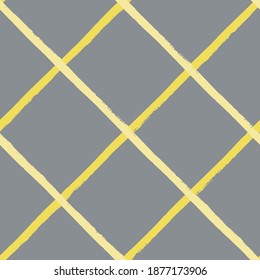 Diagonal weave grid yellow grey seamless pattern background. Painterly brush stroke effect criss cross backdrop. Simple dutone woven style diagonal geometric repeat design. Modern all over print