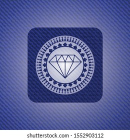 diamond icon inside badge with denim texture