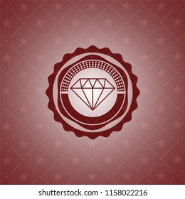 diamond icon inside badge with red background