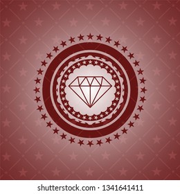 diamond icon inside badge with red background
