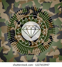 diamond icon inside camouflaged emblem