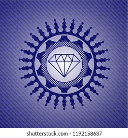 diamond icon inside emblem with jean background