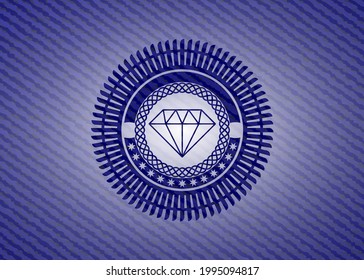 diamond icon inside emblem with jean background. 