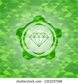diamond icon inside green emblem with triangle mosaic background