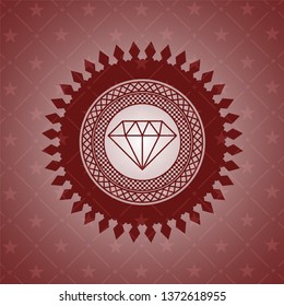 diamond icon inside red emblem