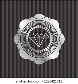 diamond icon inside silver emblem