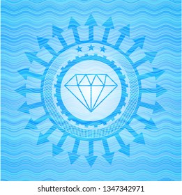 diamond icon inside water style emblem.