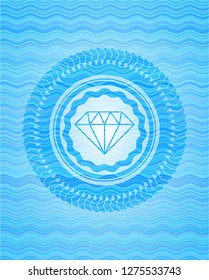 diamond icon inside water wave badge.