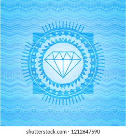 diamond icon inside water wavec oncept emblem.