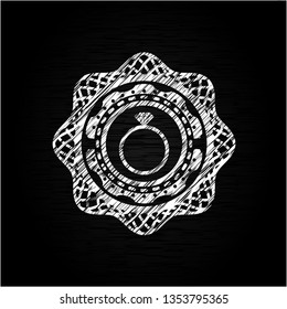 diamond ring icon drawn on a blackboard