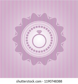 diamond ring icon inside badge with pink background