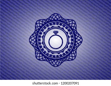 diamond ring icon inside badge with jean texture