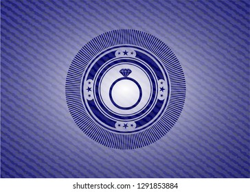diamond ring icon inside badge with denim texture