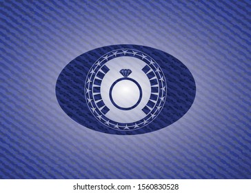 diamond ring icon inside badge with denim texture