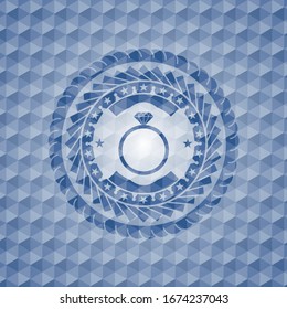 diamond ring icon inside blue badge with geometric pattern background.
