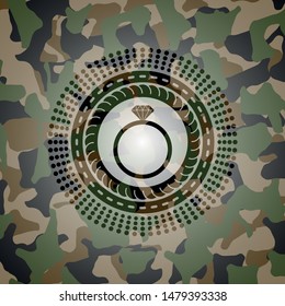 diamond ring icon inside camouflaged emblem