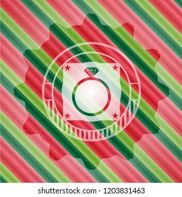 diamond ring icon inside christmas style emblem.