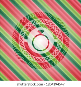 diamond ring icon inside christmas style emblem.