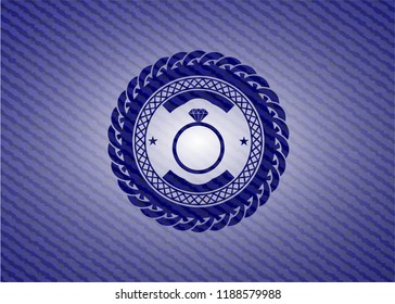 diamond ring icon inside emblem with jean high quality background