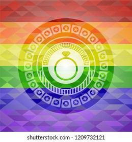 diamond ring icon inside emblem on mosaic background with the colors of the LGBT flag
