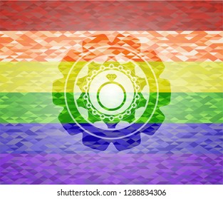 diamond ring icon inside emblem on mosaic background with the colors of the LGBT flag